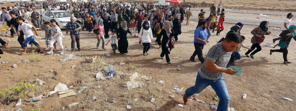 Iraqi Christians Forced Exodus from Mosul